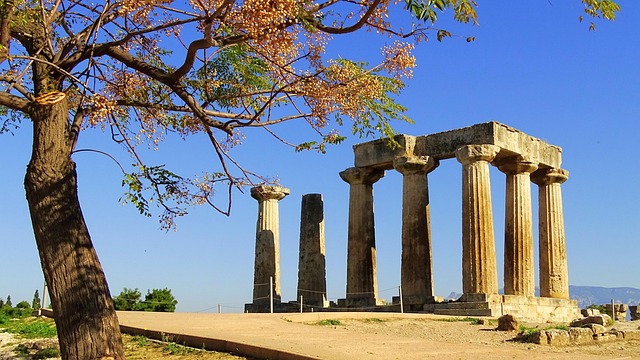 Ruins of Ancient Corinth showing temple columns and stone foundations in Greece