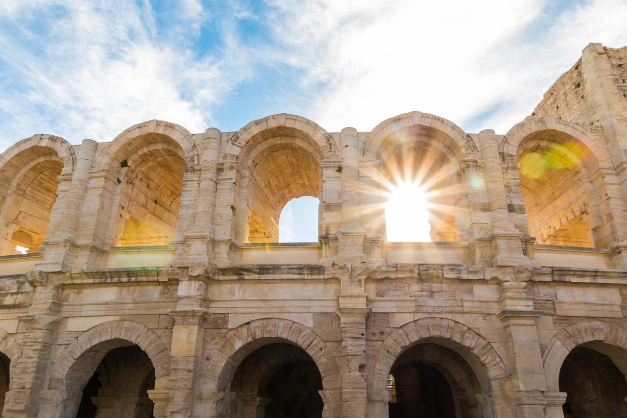 The amphitheatre of Arles at sunset with dramatic backlighting