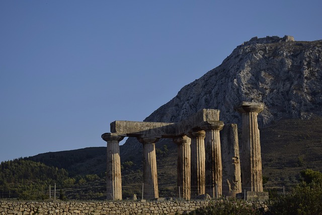 Ancient stone ruins and foundations at the archaeological site of Corinth Greece