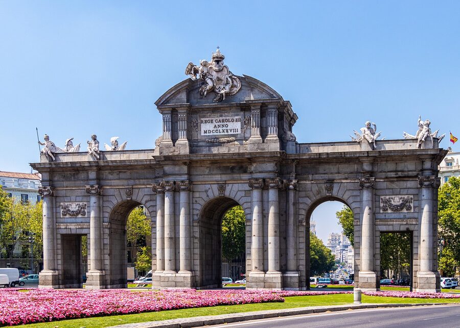 Street scene in Madrid with people walking through the city