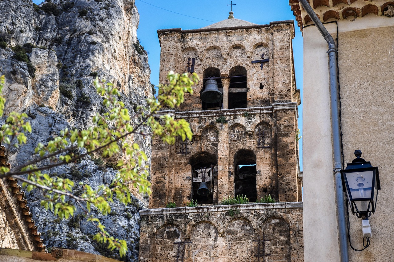 Church bell tower and medieval architecture in Moustiers-Sainte-Marie Provence France