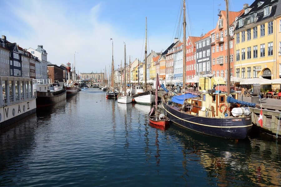 Nyhavn harbor Copenhagen Denmark with colorful houses and boats