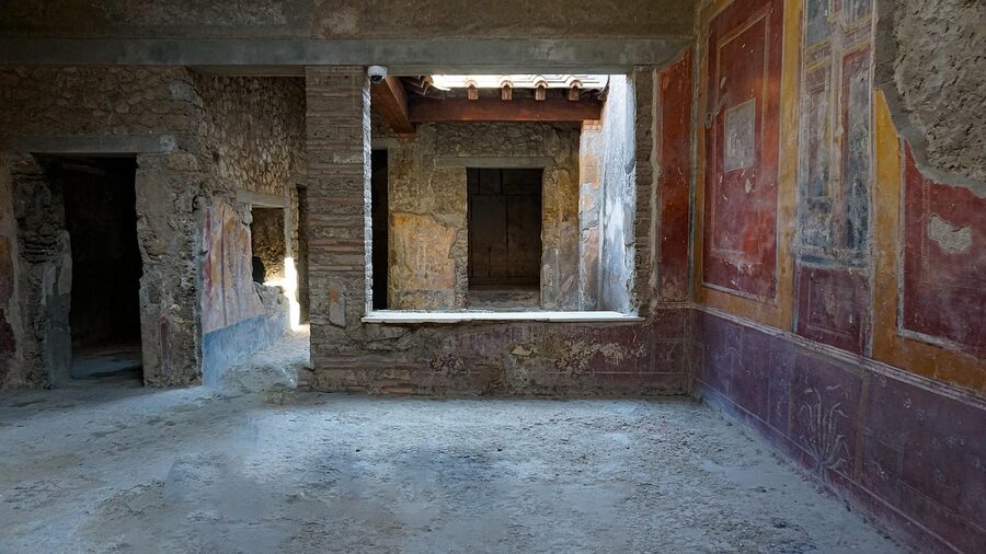 Colourful ancient wall painting in Pompeii ruins