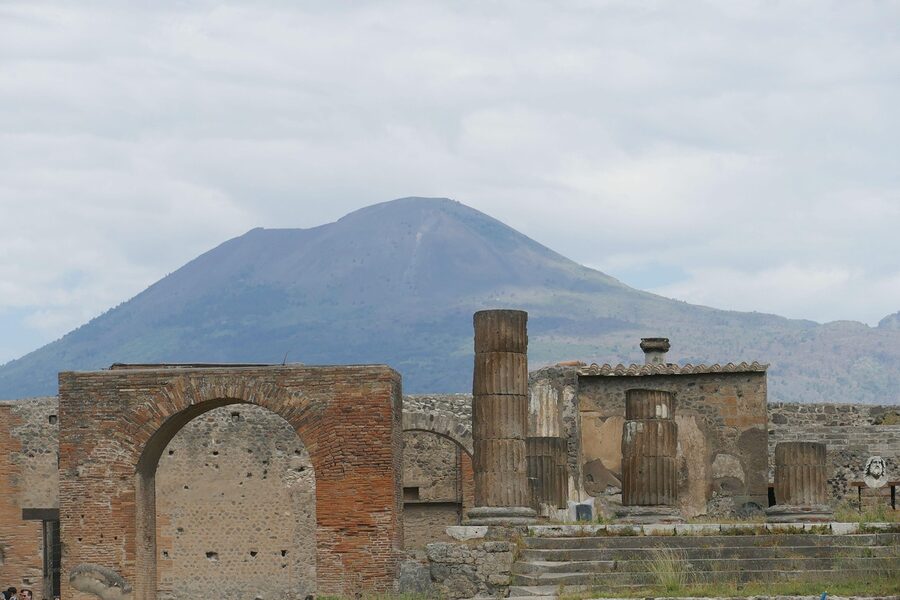 Panoramic view of Pompeii ruins with surrounding Campania landscape