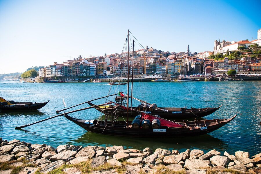 Porto rabelo boat on the Douro at golden hour