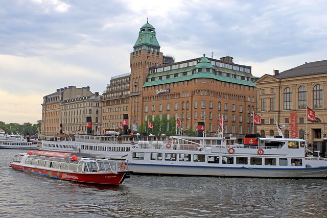 Royal Palace facade with ships in foreground in Stockholm Gamla Stan