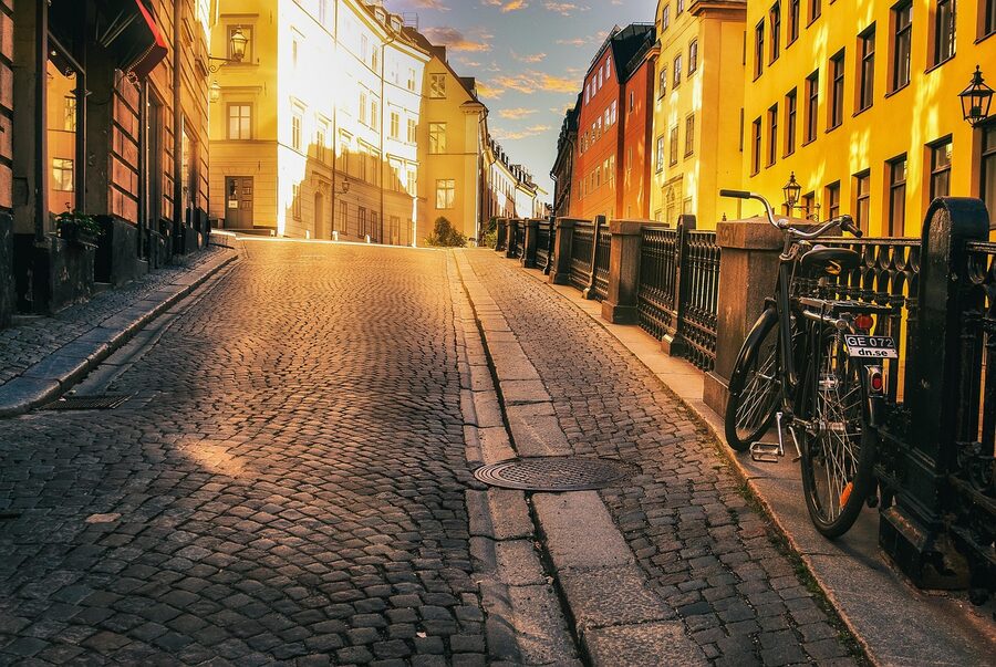 Bicycle on a Stockholm cobblestone street at sunrise