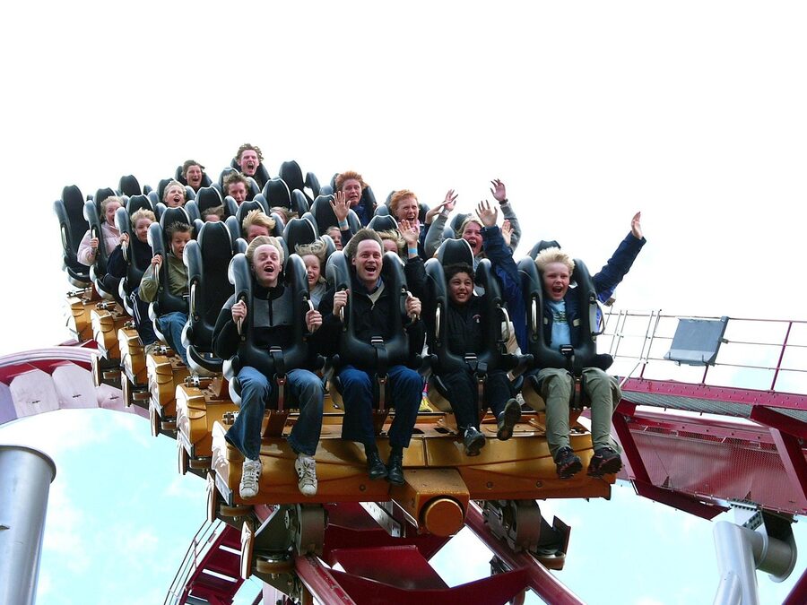 Ride at Tivoli Gardens amusement park with dramatic sky Copenhagen