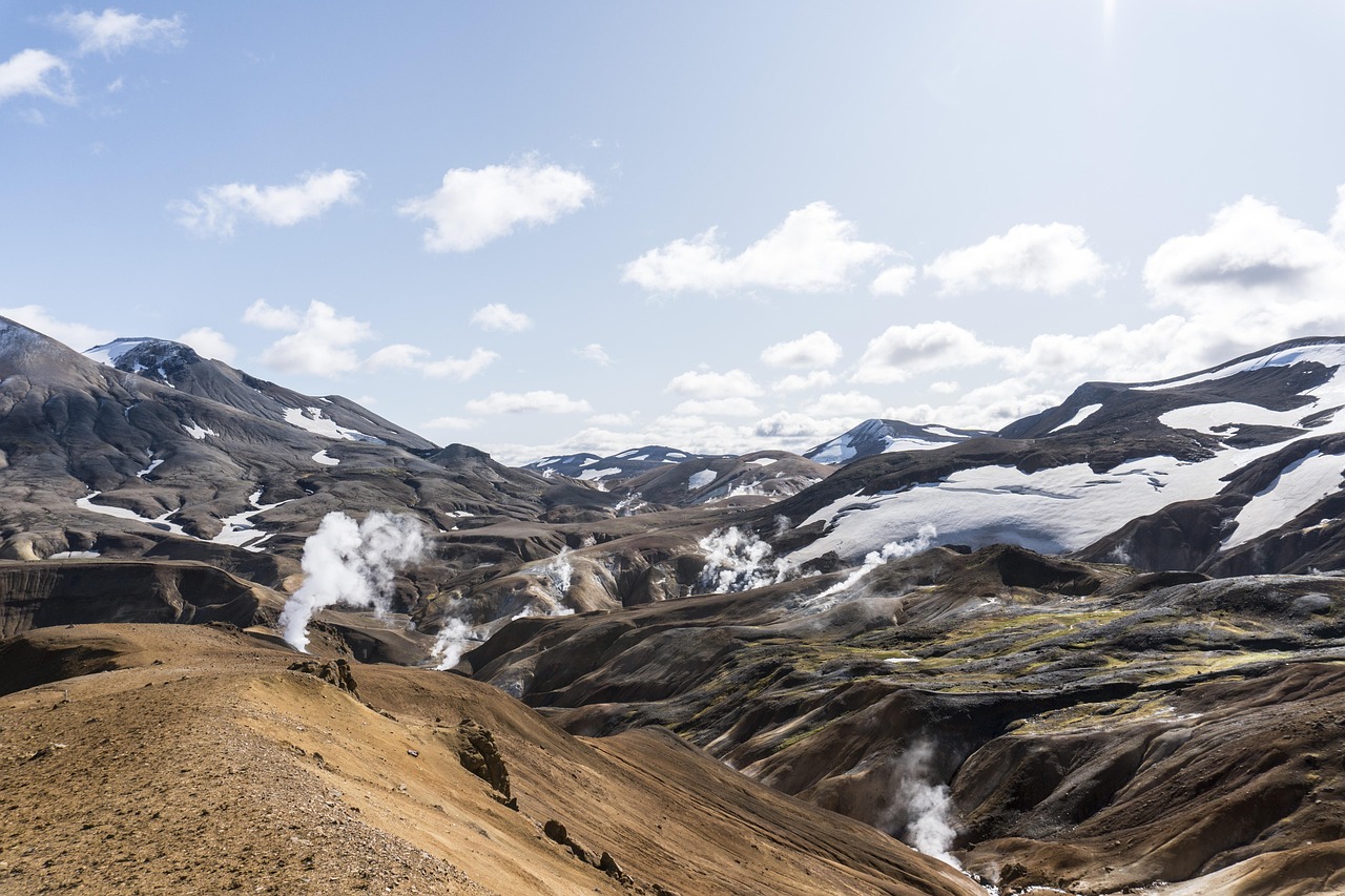 Steaming hot spring pool in Iceland's volcanic landscape