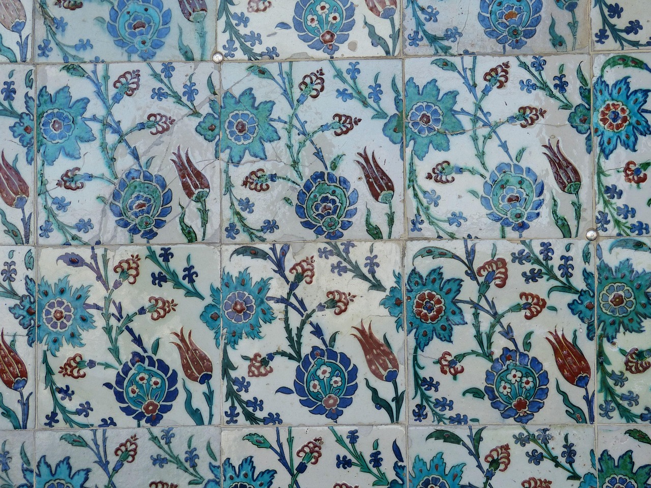 Colorful Ottoman Iznik tiles with floral patterns on a wall inside Topkapi Palace