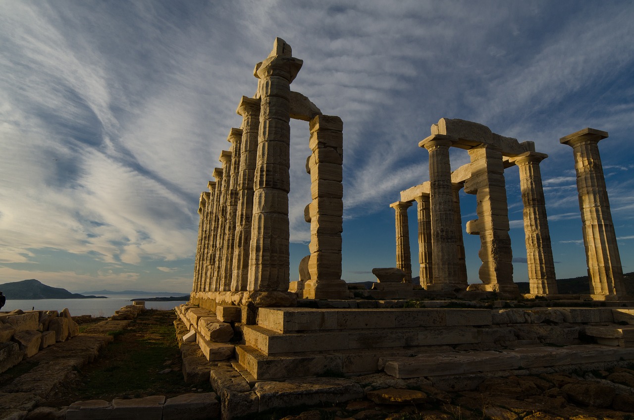 Remaining columns and ruins of the Temple of Poseidon on the rocky headland at Cape Sounion