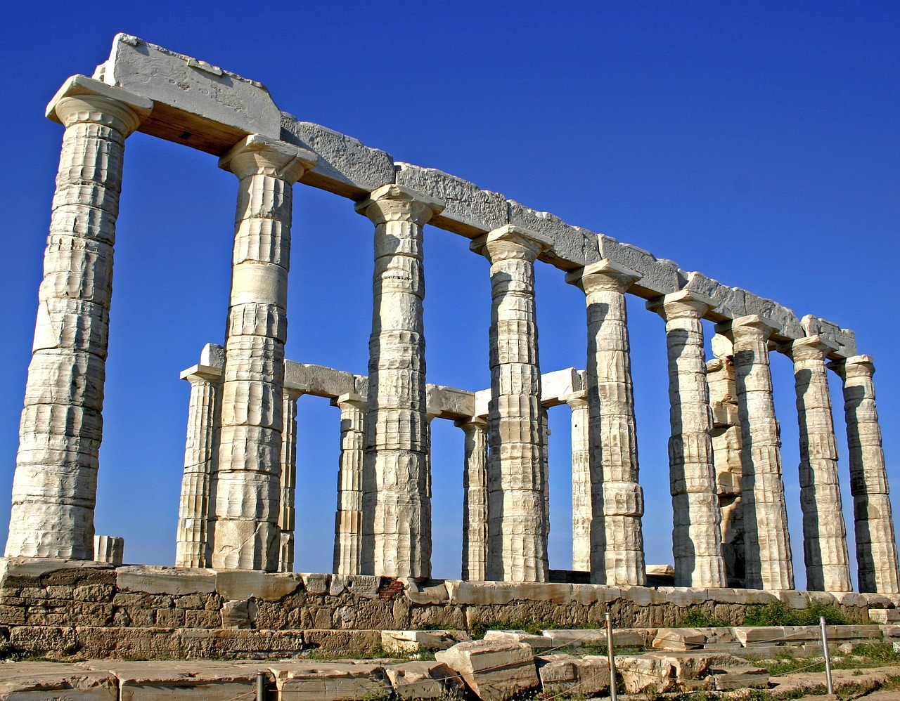 Doric columns of the Temple of Poseidon at Cape Sounion in warm light