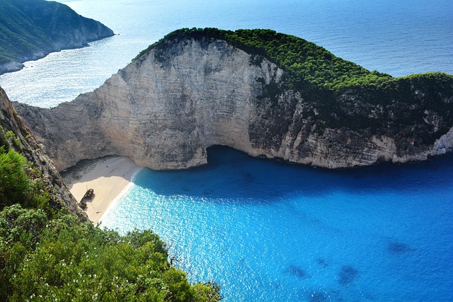 Crystal clear blue water at Navagio Beach in Zakynthos Greece