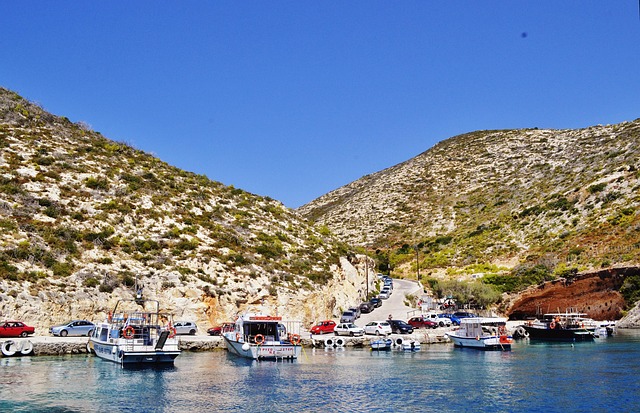 Boats moored in the blue bay of Porto Vromi on Zakynthos island
