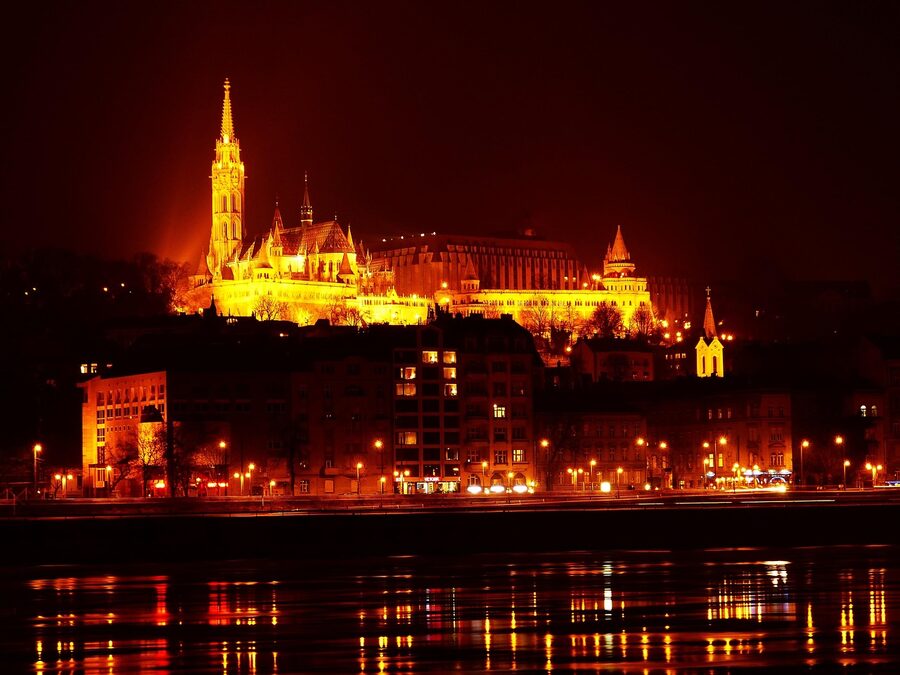 Fishermans Bastion and Matthias Church lit up at night in Budapest
