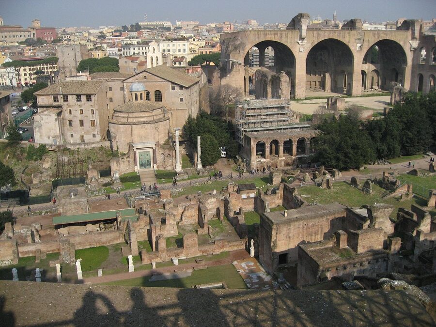 Ruins of the Roman Forum in Rome with ancient stone walls and architectural remains