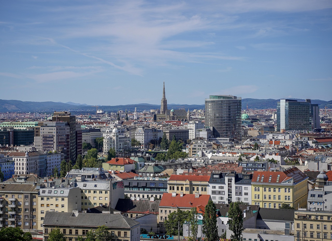 Panoramic aerial view of Vienna's historic city center with the Danube in the distance