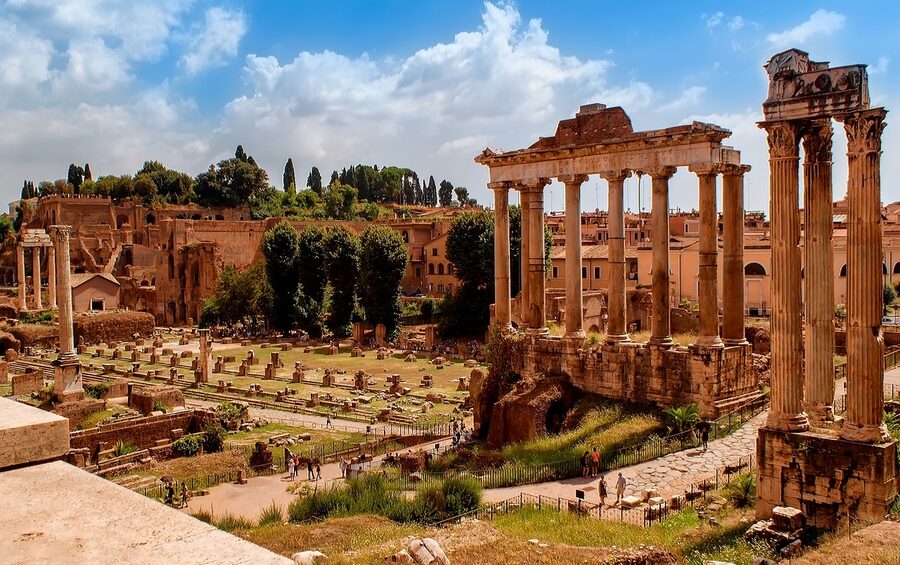 Wide view of the Forum Romanum ruins in Rome with ancient columns and temple remains