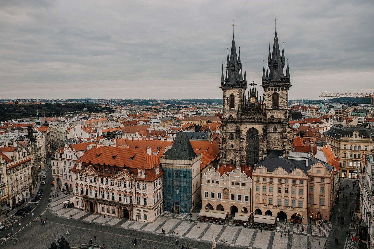 Prague Old Town Square with red rooftops and historic buildings