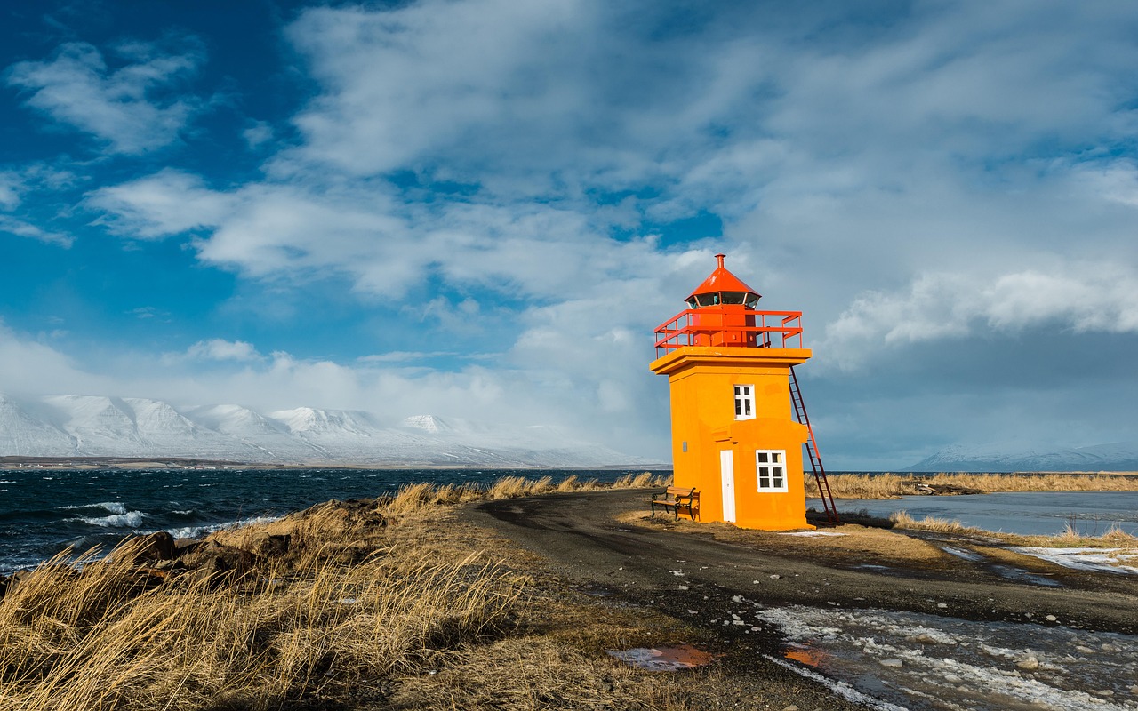 Dramatic Icelandic coastline with dark volcanic rock and ocean waves