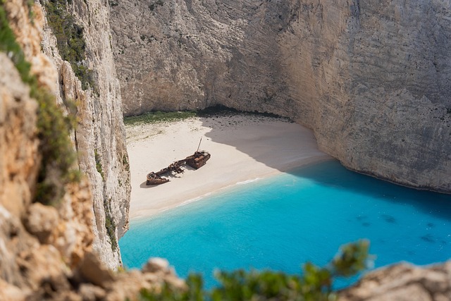 Aerial view of the shipwreck on Navagio Beach surrounded by white sand
