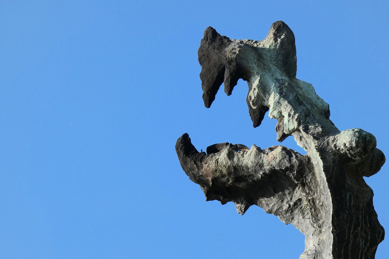 The Wawel Dragon sculpture in Krakow, a bronze statue of a dragon's head