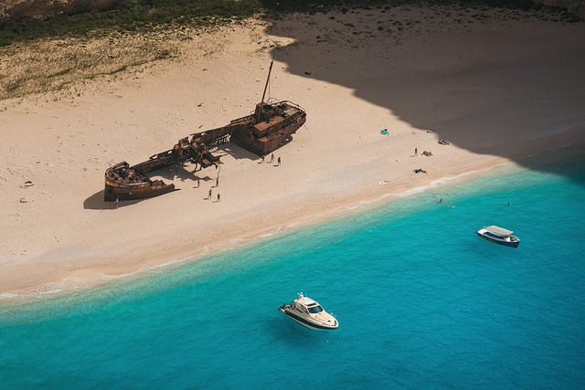 Aerial photograph of Navagio Beach showing the shipwreck on sand with turquoise water