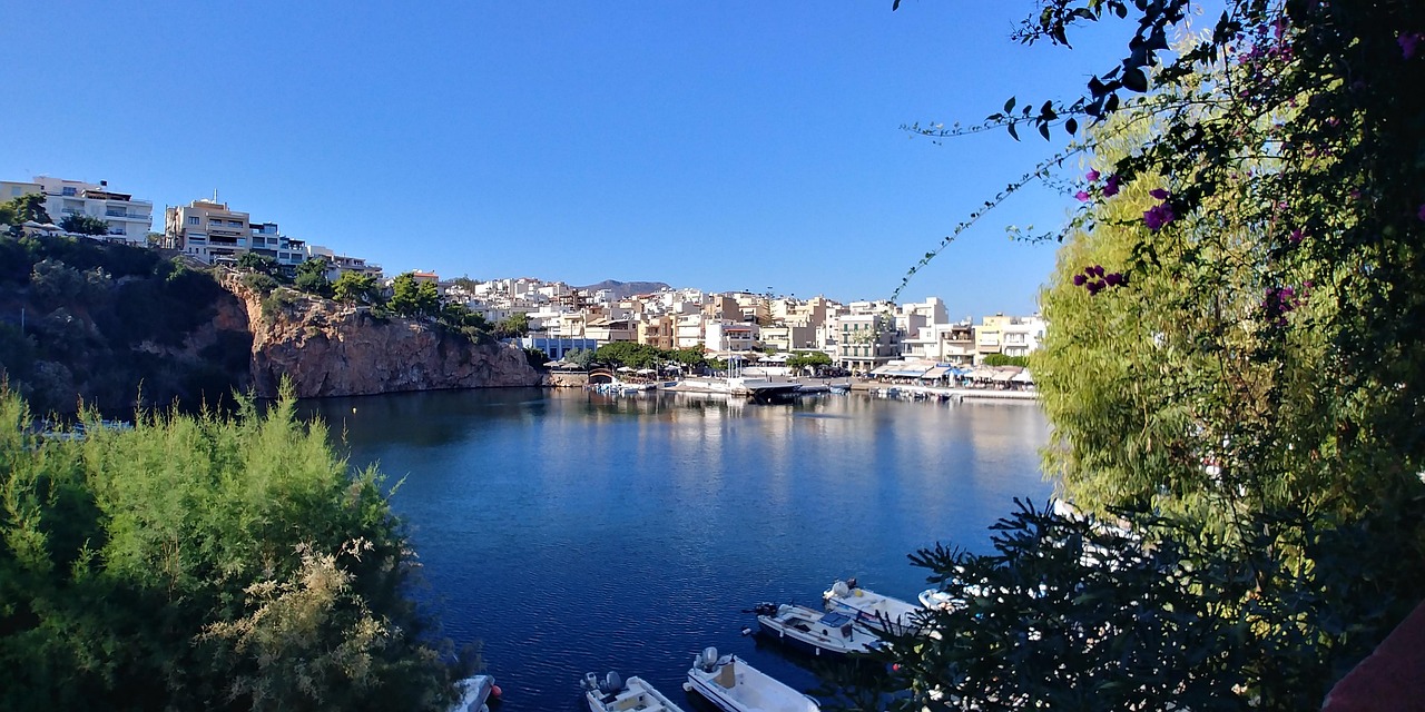 Agios Nikolaos town with Lake Voulismeni and colourful buildings along the waterfront