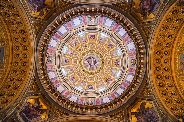 Interior dome of St. Stephen's Basilica showing painted frescoes and gilded decorations