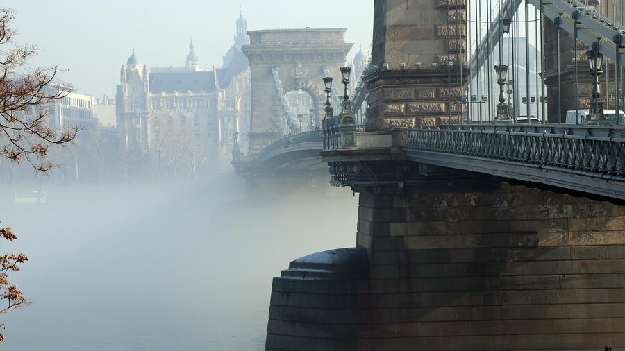 Chain Bridge disappearing into morning fog over the Danube in Budapest