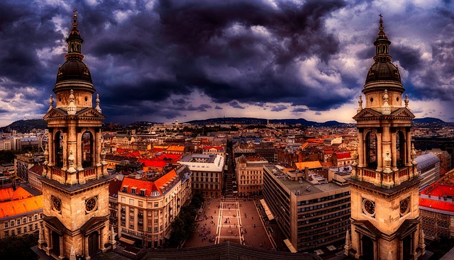 Panoramic view of Budapest cityscape with the dome of St. Stephen's Basilica at sunset
