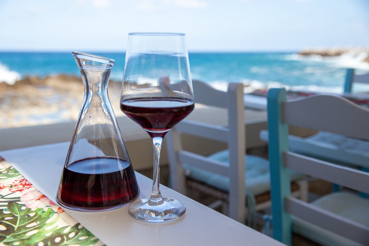 Glass of local Cretan wine at a seaside restaurant