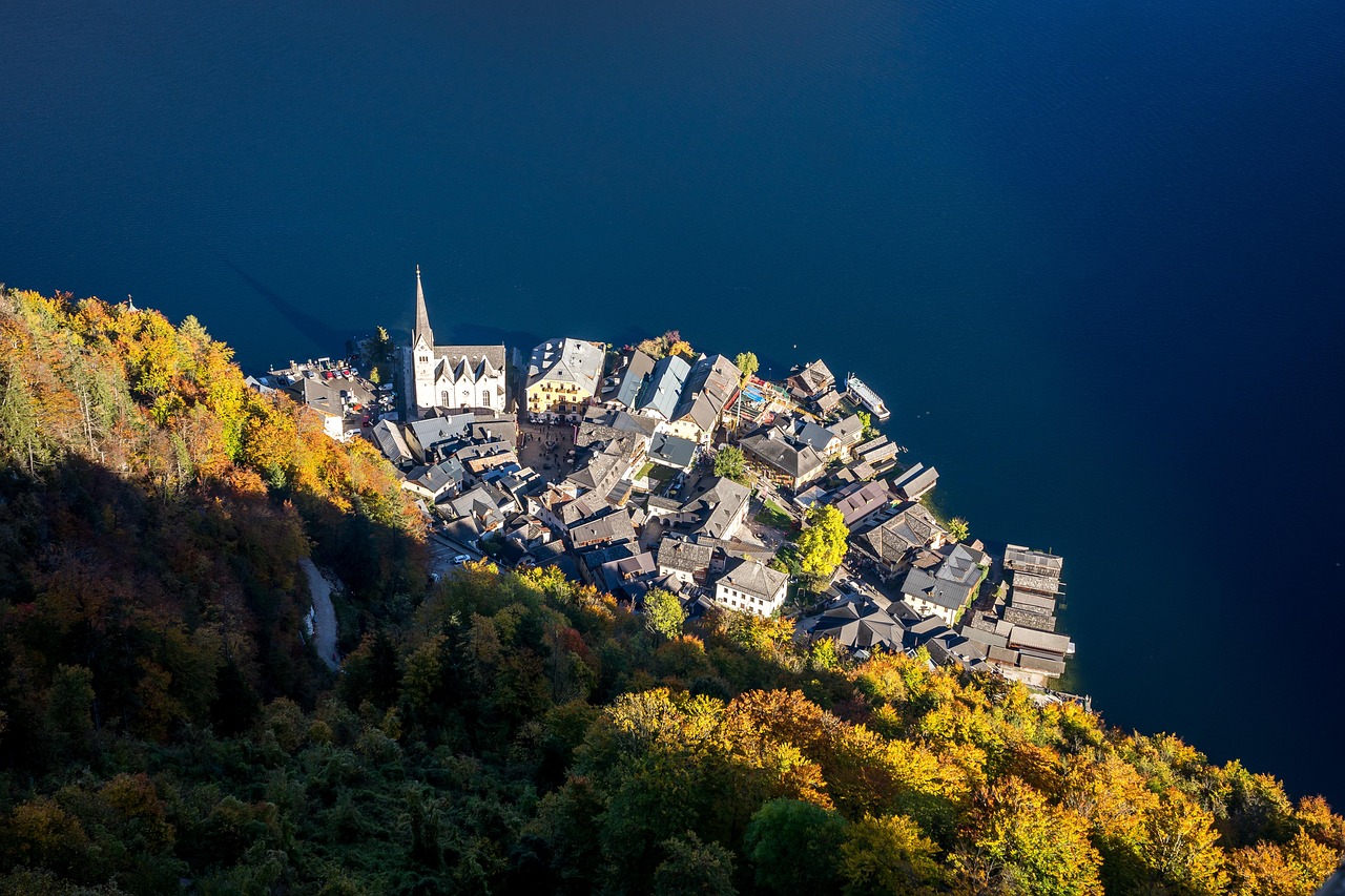 Hallstatt lakeside view with the church tower and alpine mountains