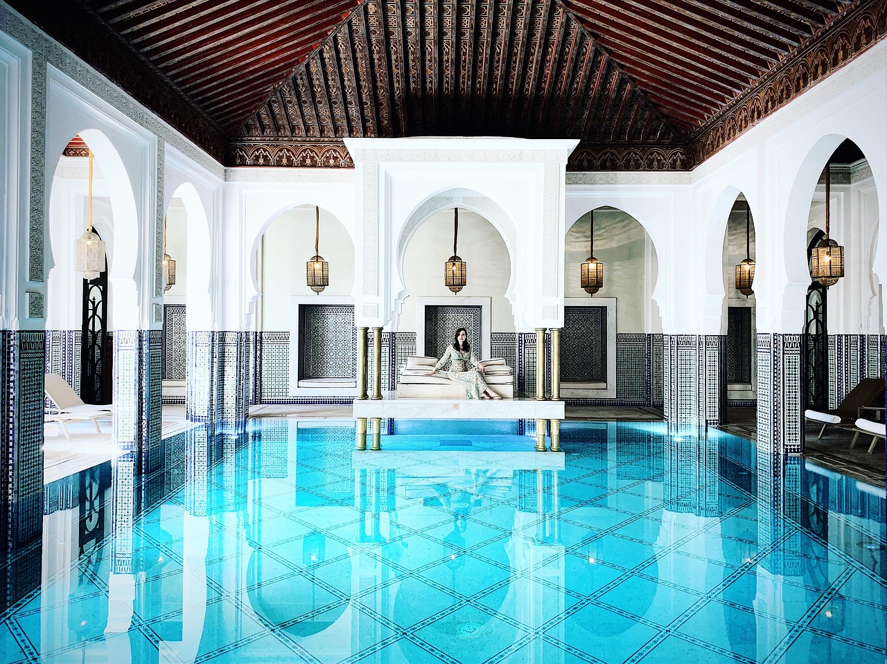 Ornate tiled pool inside a traditional hammam