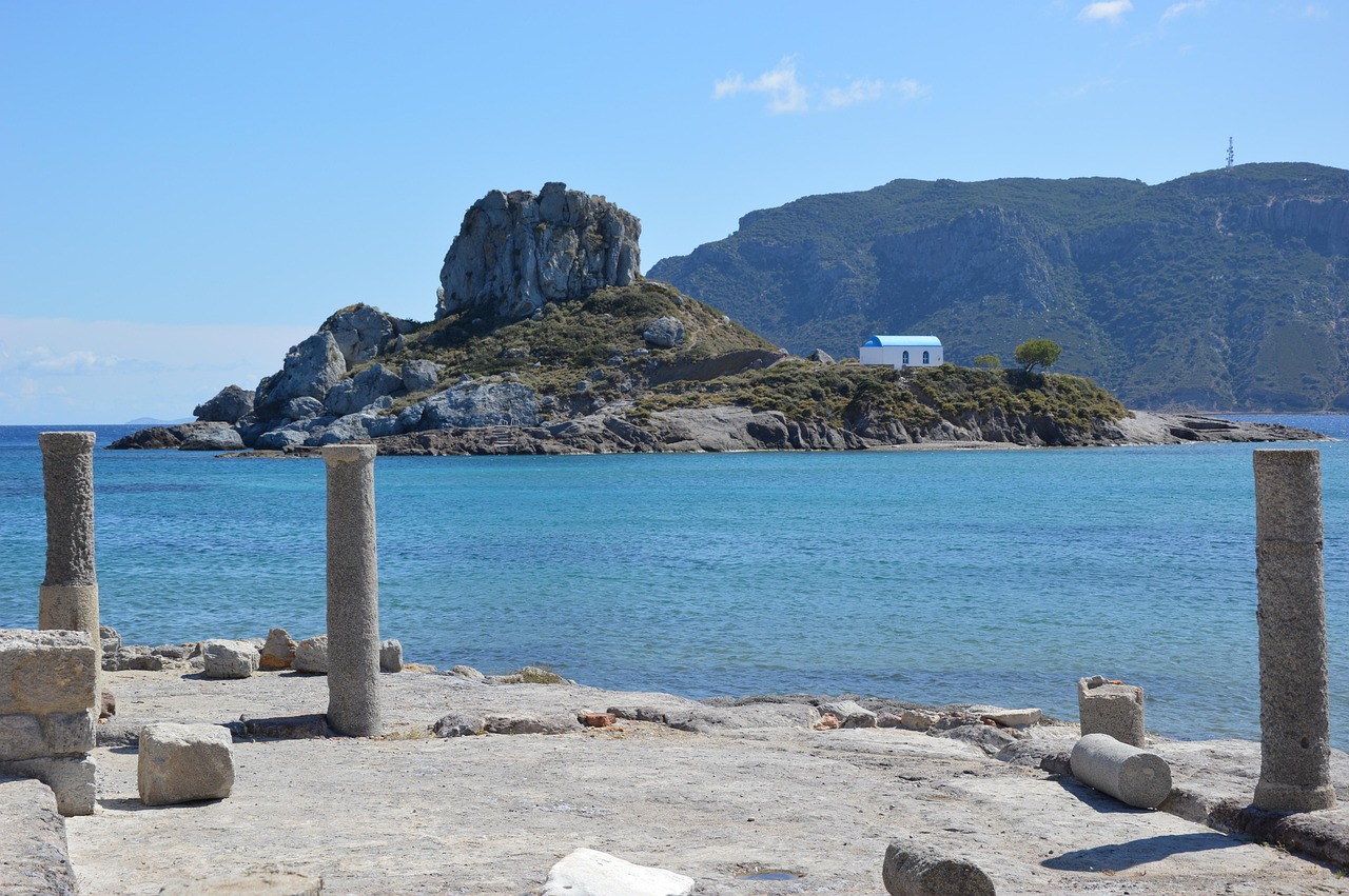 Panoramic view of Kos Town harbor with the Castle of the Knights in the background
