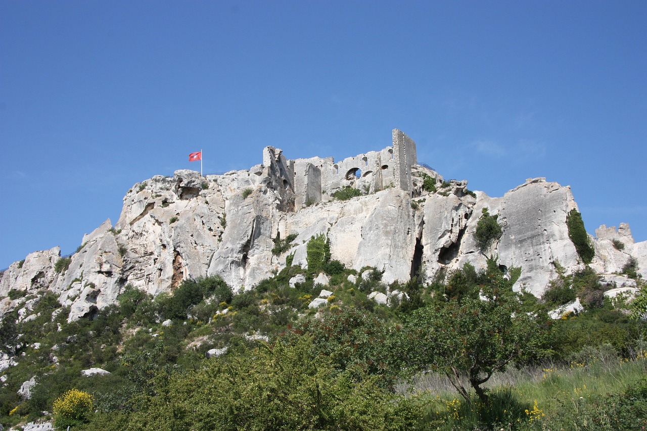 Remains of the medieval castle at Les Baux-de-Provence surrounded by rocky limestone terrain