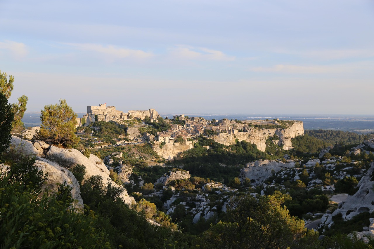 Panoramic view of Les Baux-de-Provence and the Alpilles countryside in warm evening light