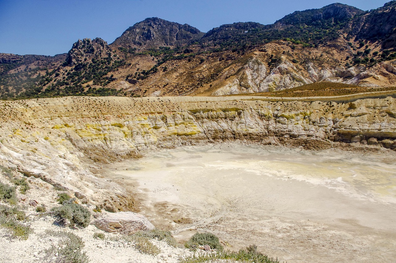 The Stefanos volcanic crater on Nisyros island with sulfur deposits and steam