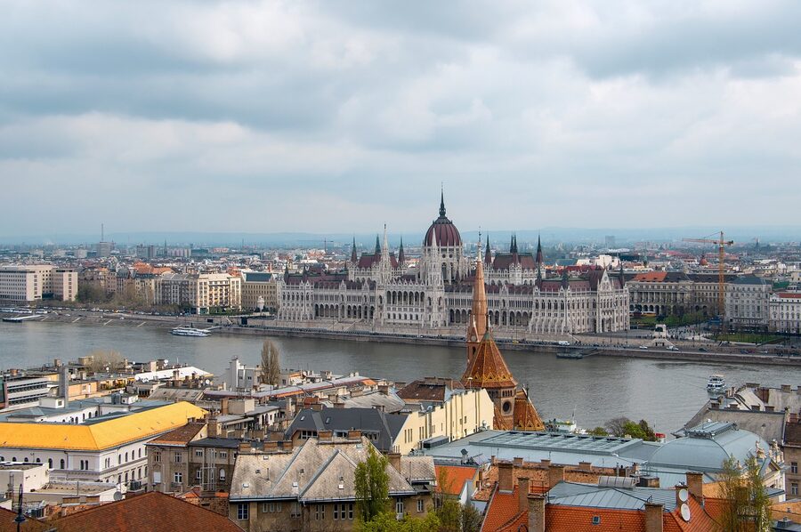 Hungarian Parliament Building and Buda Castle in Budapest cityscape from across the Danube