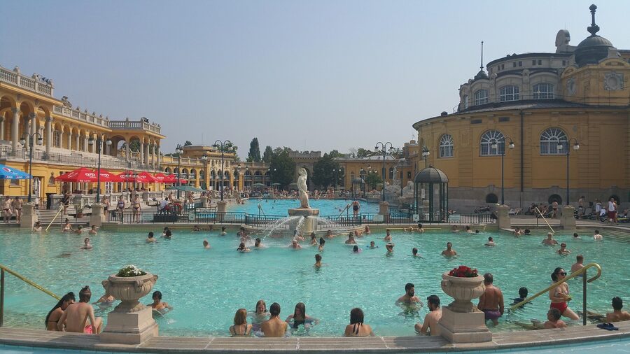 Interior of Szechenyi Thermal Baths showing ornate architecture and thermal pool