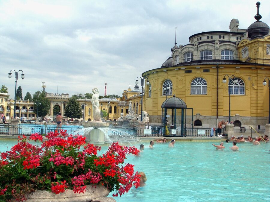 Thermal pool interior with arched ceiling and warm lighting in Budapest spa