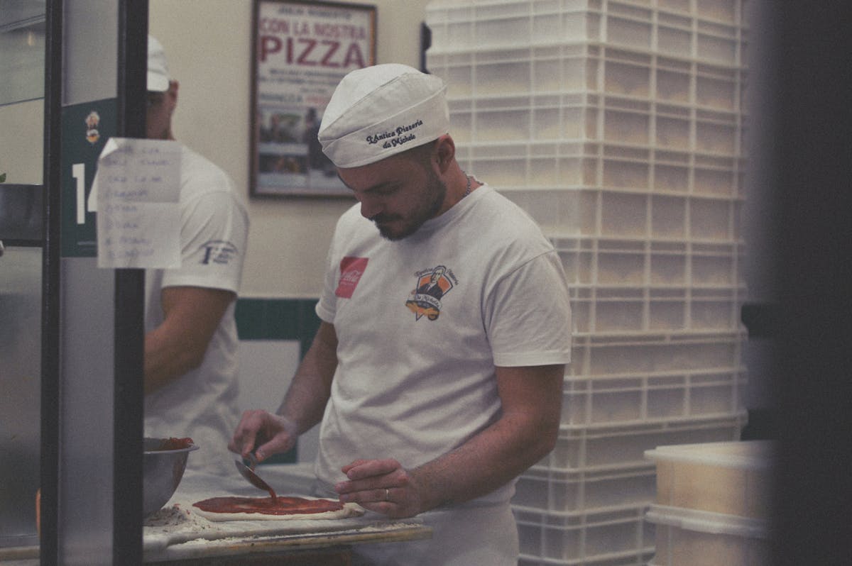 Making pizza in a Naples kitchen