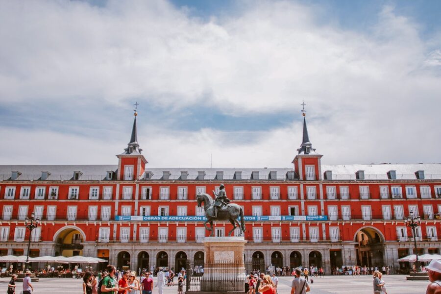 Plaza Mayor in Madrid showing its historic red architecture