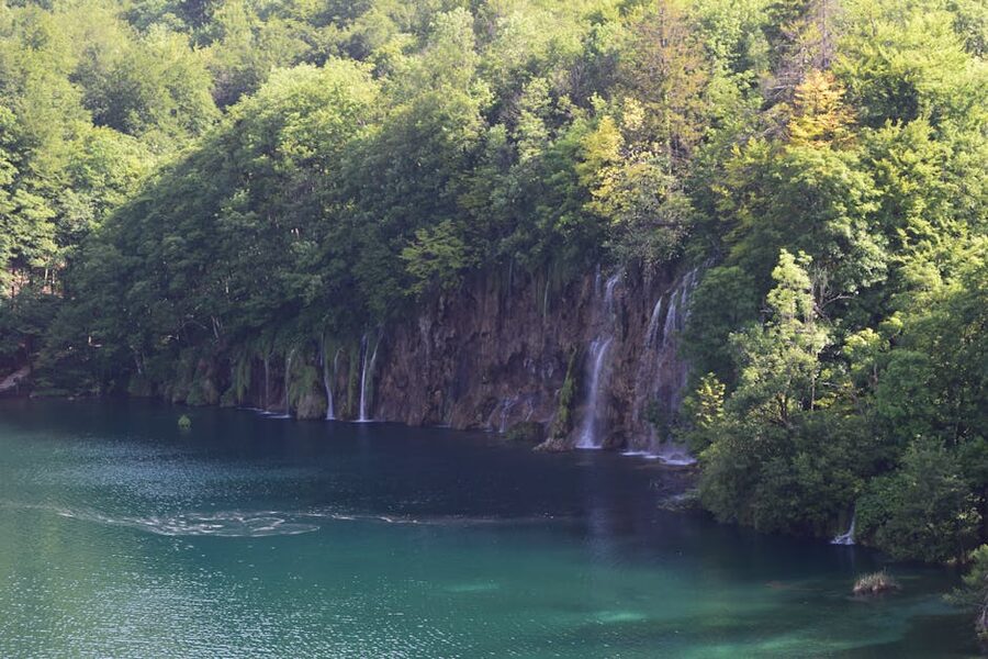 Plitvice cascading waterfalls lush greenery