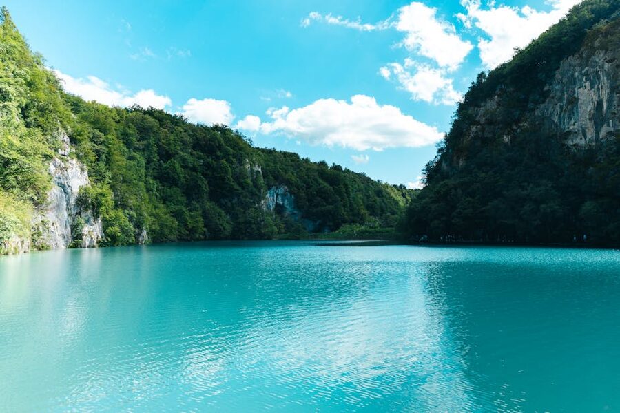 Plitvice turquoise waters surrounded by greenery Croatia