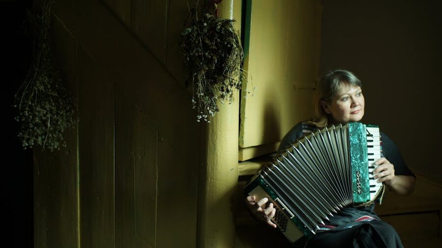 Accordion player in folk band