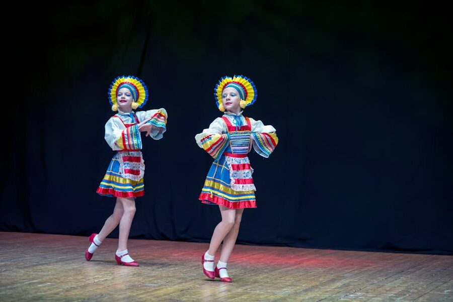 Folk dancers performing on stage