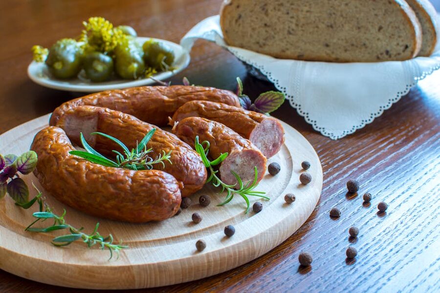 Polish smoked sausages with bread and pickles