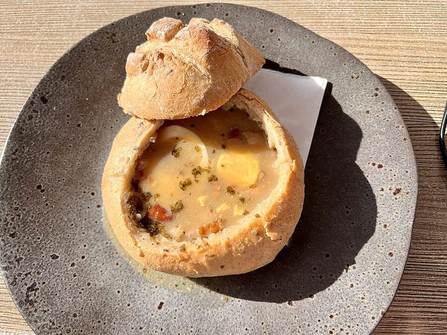 Polish sour rye soup zurek in bread bowl