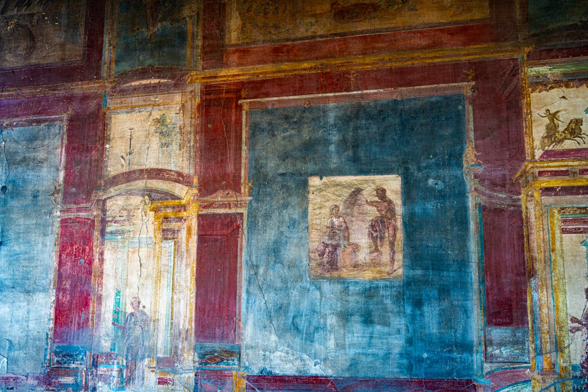 Colorful ancient Roman fresco on a wall in Pompeii Italy